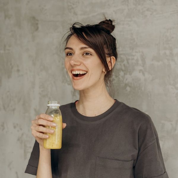 Person looking calm and content after a light exercise session.